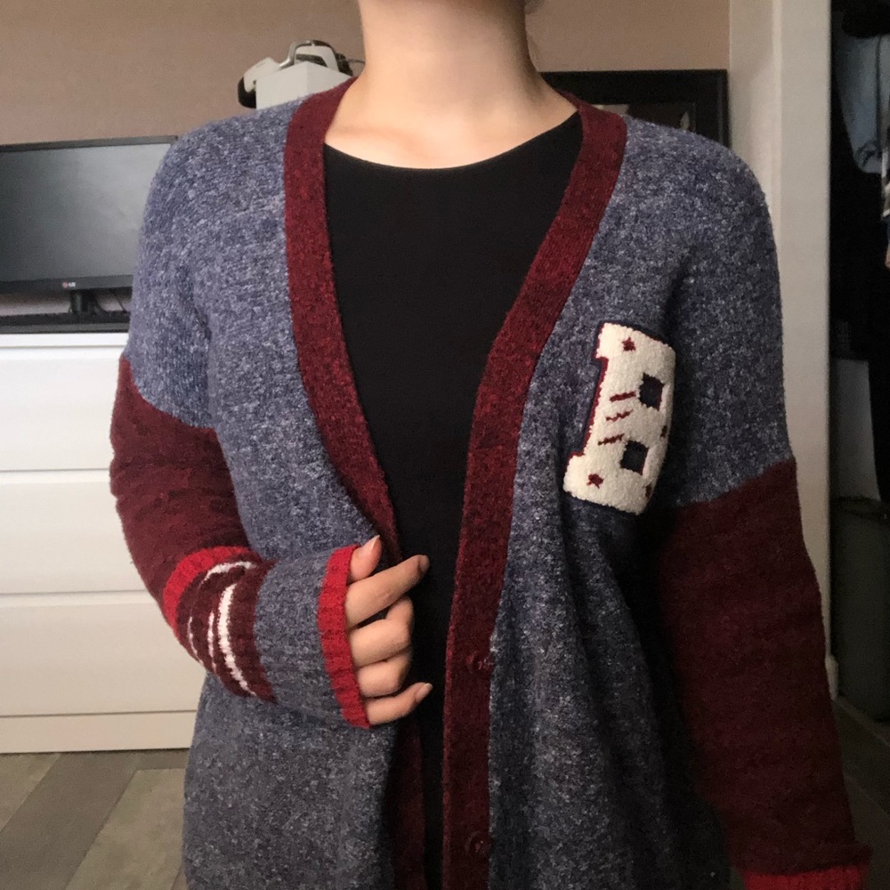 Red and blue knit cardigan.